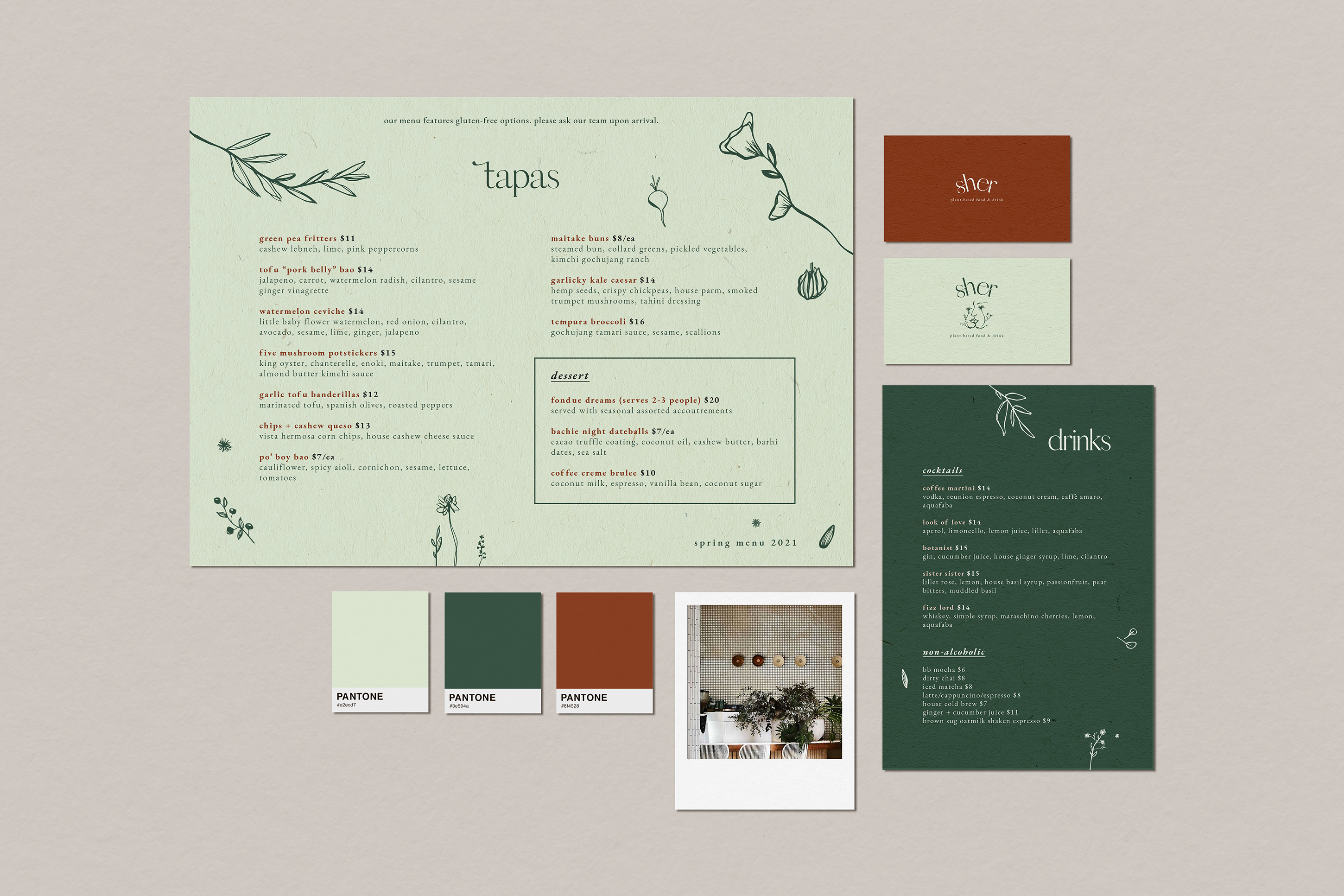 Sher stationary including the food and drink menus, two business cards, pantone brand colours and a polaroid of              the restaurant